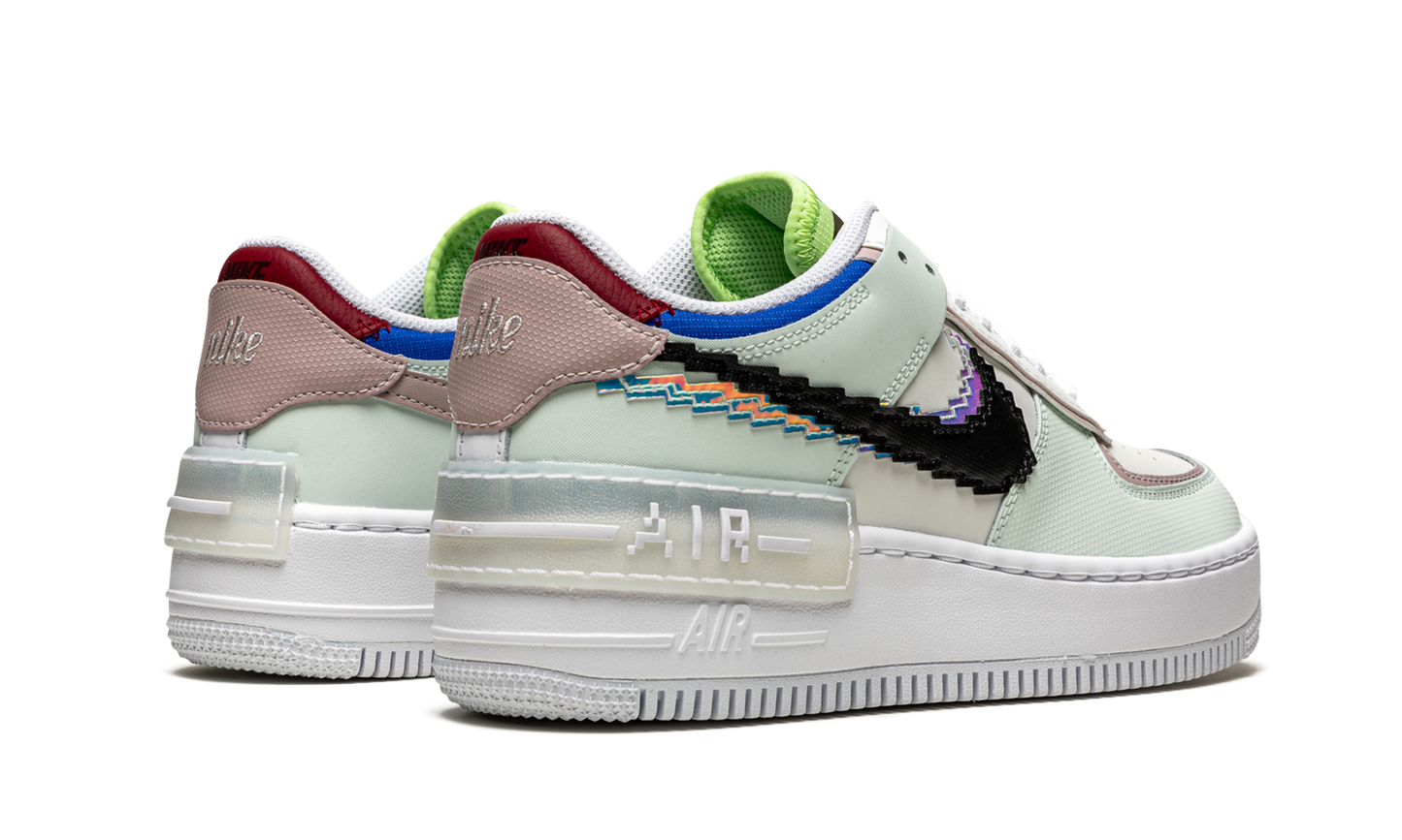AF1 SHADO SE WMNS"Pixel Swoosh" CV8480 300